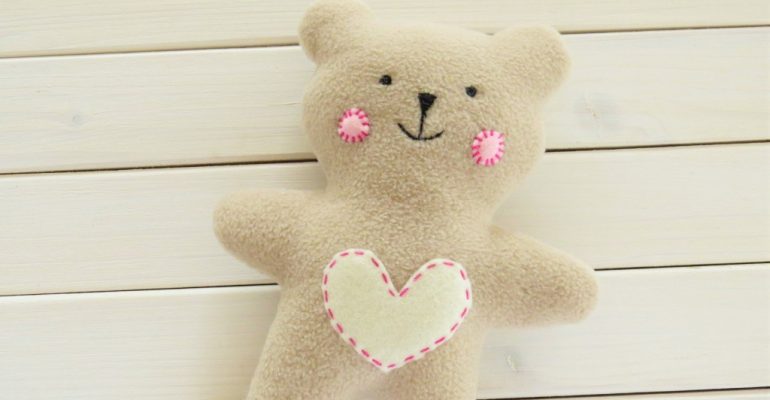 Sewing a teddy store bear